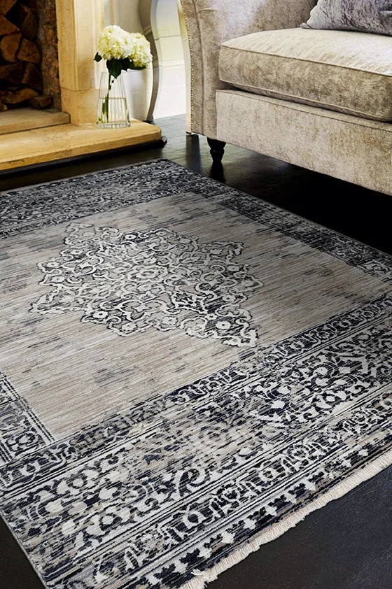 grey traditonal rug with modern geometic border