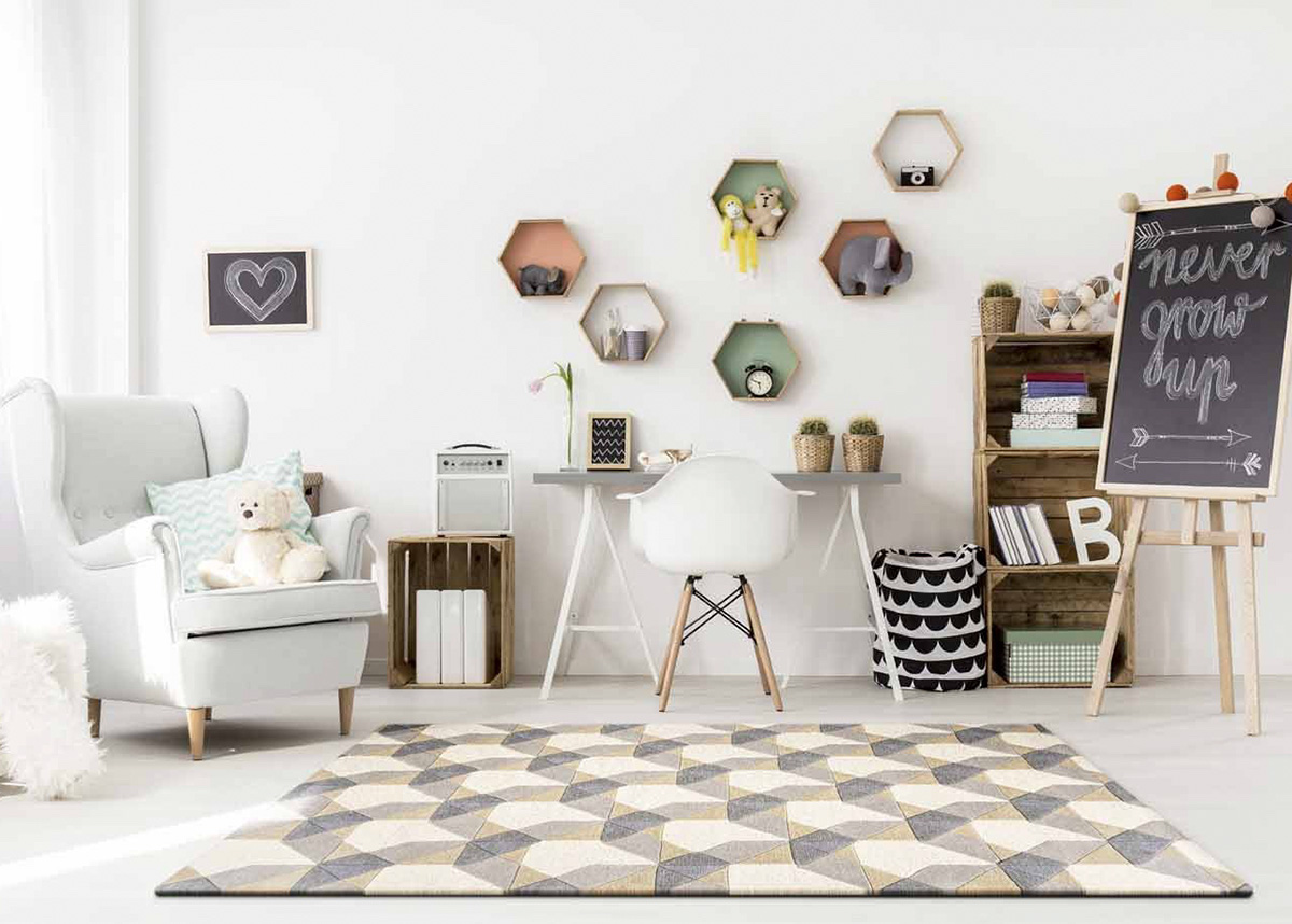 baby nursery with plush geometic rug